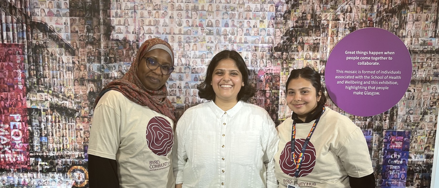 An image of three Byres Hub volunteers, two are wearing their volunteer t-shirts