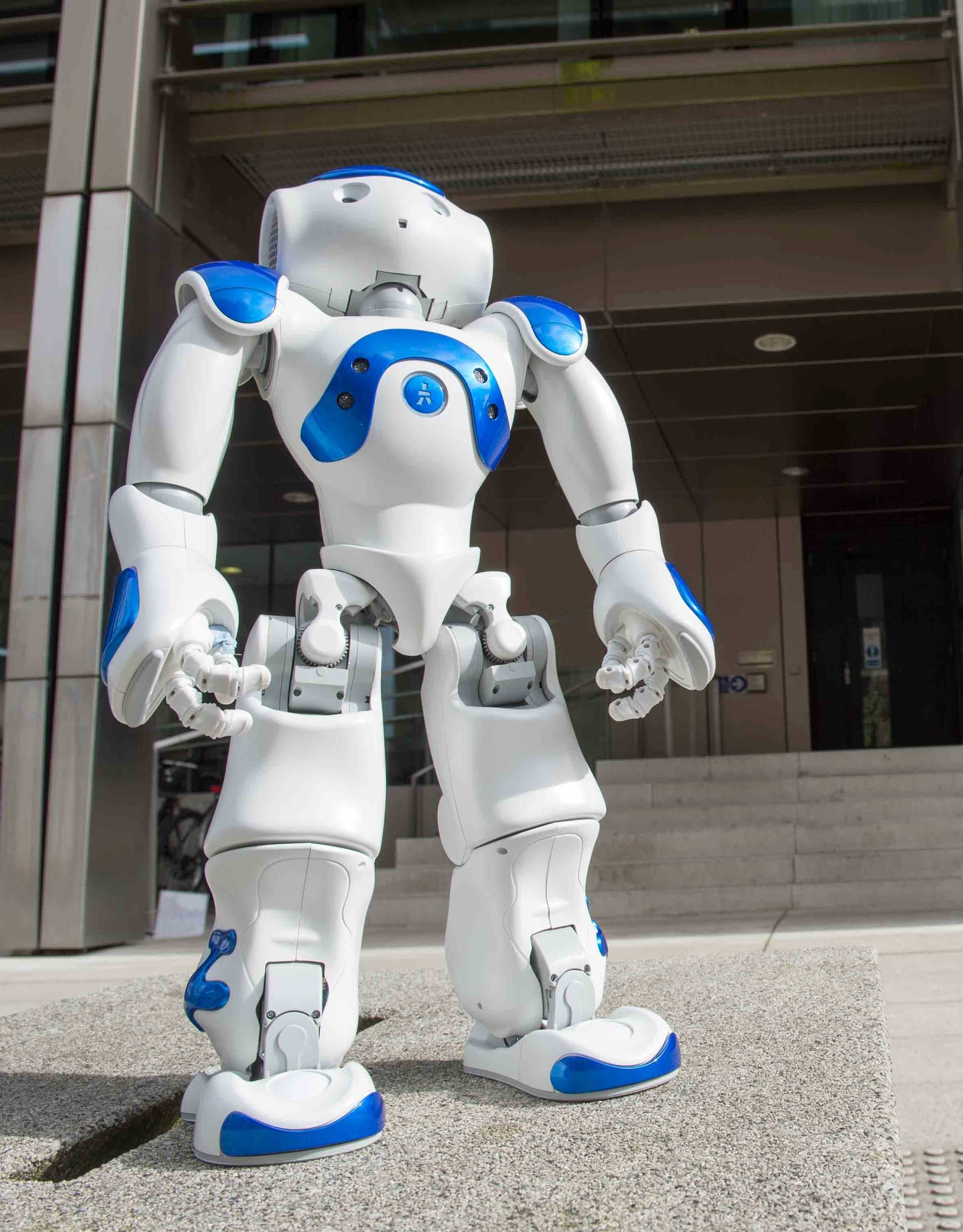 A robot standing outside a building
