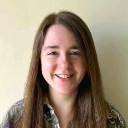 Headshot of Abi Finn smiling to camera