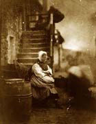 Newhaven fishwife, sitting on her steps