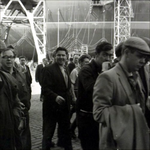 Workers leaving the yard at the end of the shift.