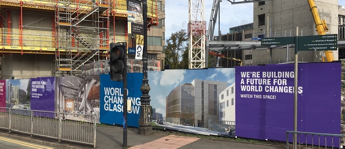 UoG branded hoardings around LTH site