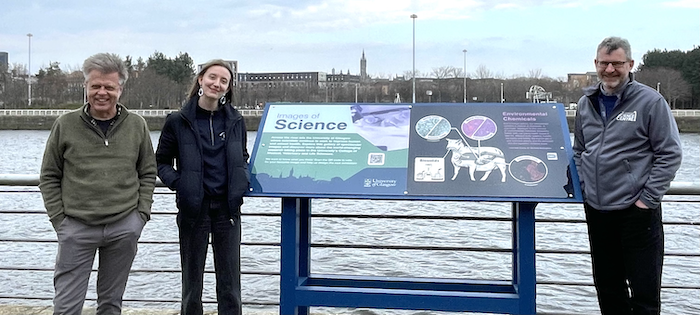  Professor Kevin O’Dell, Ella Ottersbach-Edwards and Dr Robin Hoyle standing at the Images of Science Display