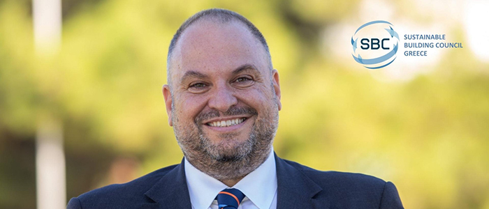 Profile photo of Alex Athanassoulas with the Sustainable Building Council Greece logo in the top left corner