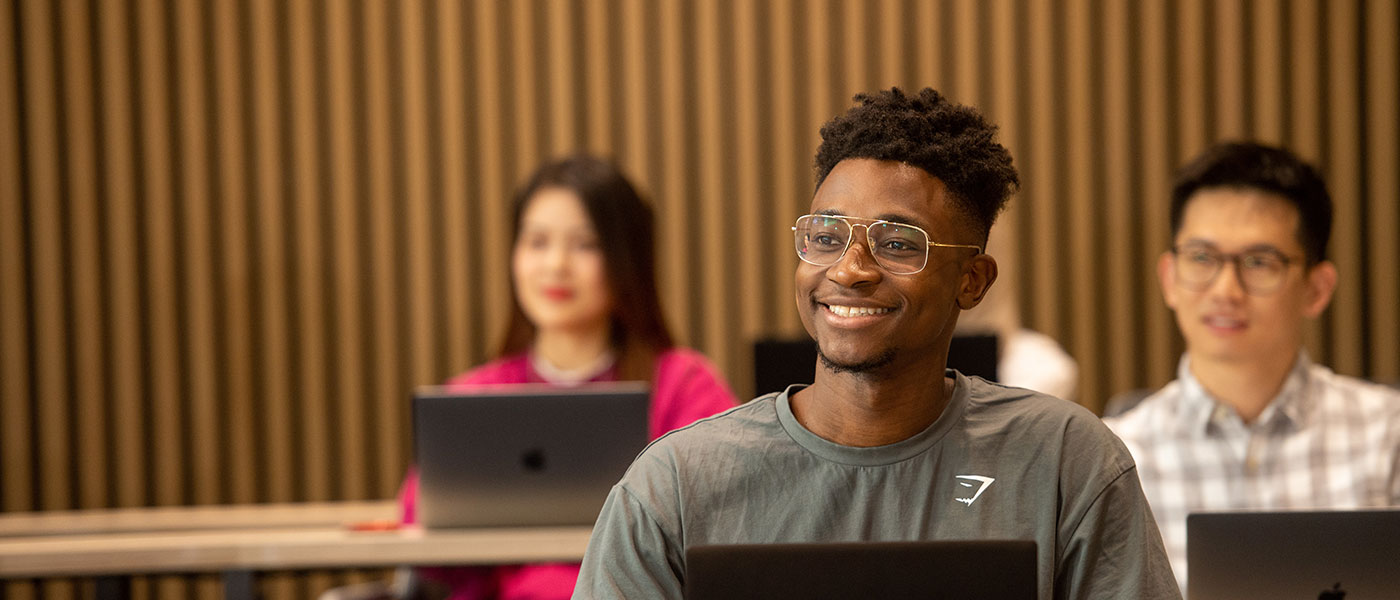 A student studying in the Saltire lecture theatre