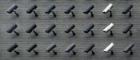 Multiple CCTV cameras on a wall