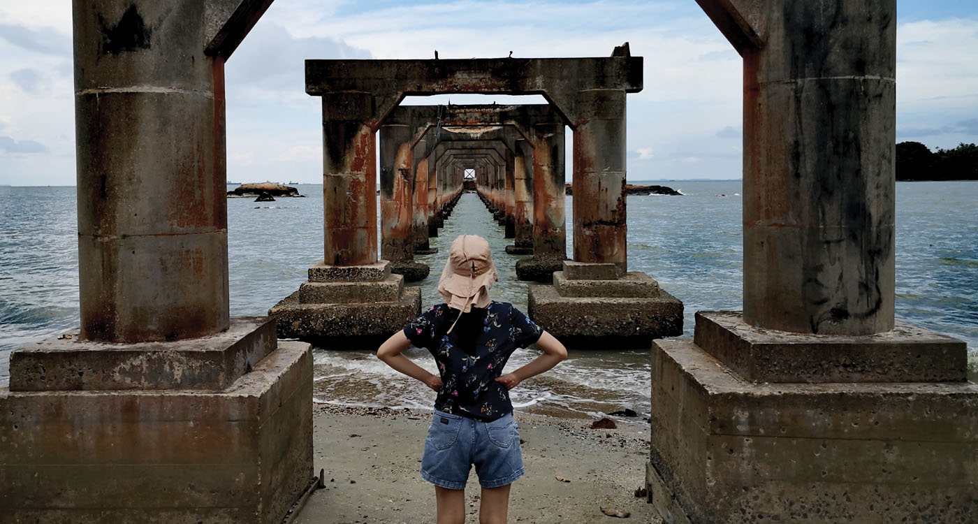 Angie Sin (MRes 2008, PhD 2018) reflects at Perhentian Island in Malaysia.