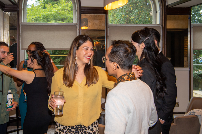 Guests talking at the 2022 MBA reunion dinner