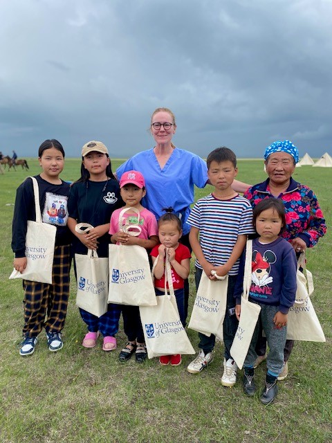 Janice Richardson with children in Mongolia