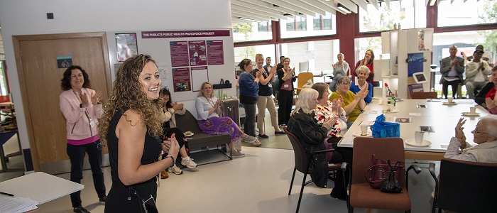 An image of Susan Grant speaking at the Byres Community Hub Photovoice Launch